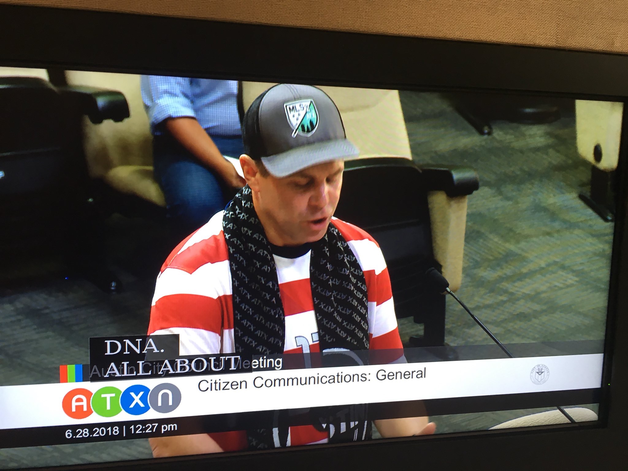 Shawn Collins speaking at City Hall in June 2018